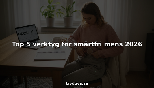 Kvinna som använder en smärtlindrande enhet mot mensvärk